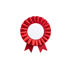 Circular pleated red ribbon winners rosette with blank white center for applying a design to. Photographed on a blank white background.