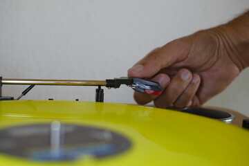 Yellow Vynil on vintage Turntable