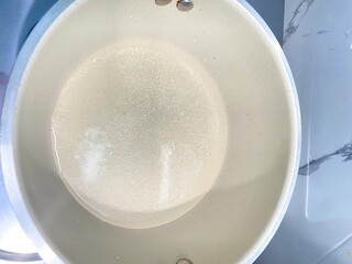 Boiling Sugar Crystals in Pot, Top View
