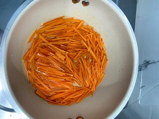Julienned Carrots in Pan, Cooking Icon