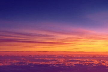 Soft blue sky gradually transitioning into vibrant sunset hues, peaceful and heavenly, picturesque, serenity.