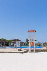 Lifeguard tower on the beach with blue sky background, Sardinia Italy 