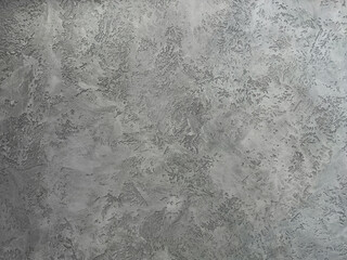 Decorative gray venetian plaster wall background, smooth, seamless luxury stucco surface for architecture, art and highend interior design.
