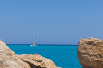 Sailboat on the azure waters of the Mediterranean Sea. Sardinia Italy