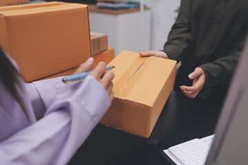 Portrait of Starting small businesses SME owners, two Asian woman check online orders Selling...