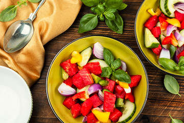 Gourmet salad with vegetables and watermelon.