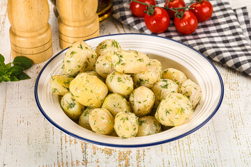 Young boiled mini potato with dill
