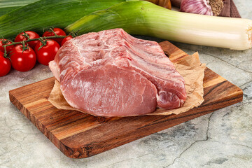 Raw pork loin cut with bone