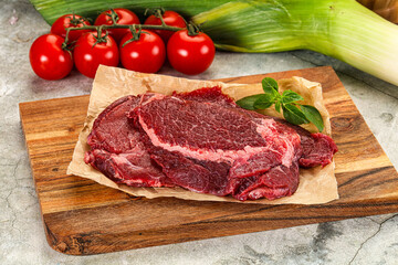 Raw beef cheeks cut for cooking