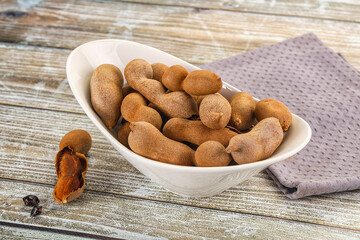 Tropical exotic Tamarind fruit heap