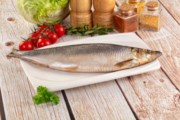 Raw whole salted herring fish