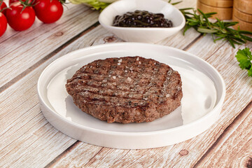 Grilled juicy beef cutlet for burger