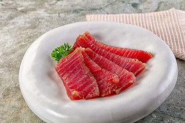 Raw red tuna sashimi slices