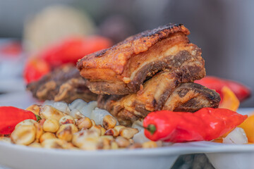 Peruvian delicacy "Crispy Roasted Pork (Caja China)"