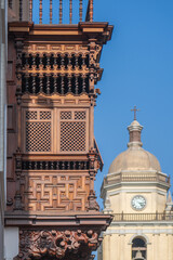 An ancient wooden balcony in the historical center of Lima, Peru