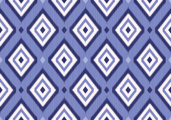 A seamless ikat pattern with diamond motifs in shades of gradients blue on soft purple background. The texture mimics handwoven threads, creating a rhythmic, ethnic elegance.