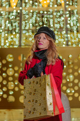 Woman with shopping bags at Christmas