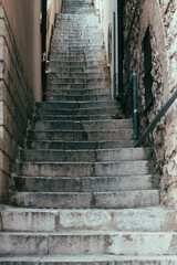 Old Stone Staircase in Narrow European Alleyway