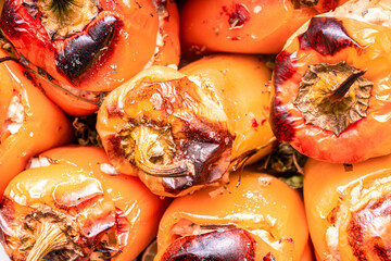 Peppers baked with minced meat. Appetizing stuffed peppers, close-up, background
