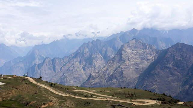 Panoramic vista of the Nanda Devi Mountain Range captured from Auli, a popular ski destination based in Joshimath, Uttarakhand, India.