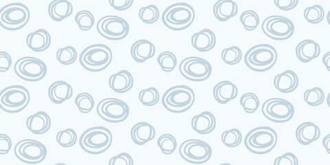 Seamless vector pattern with abstract hand drawn circles in pastel blue on a light background. Modern, bold, and stylish design, perfect for textiles, wallpapers, branding, and creative projects.