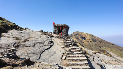 Ancient, small stone temple ruin spotted during a trek in Tungnath, Chopta, Rudraprayag, Uttarakhand, India.