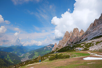 view from Grodner Joch to tourist resort St. Ulrich, Cirspitzen mountains, dolomites alps