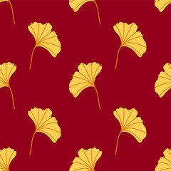 Seamless pattern of yellow ginkgo leaves on a deep red background. For textiles, wallpapers and decorative design projects.