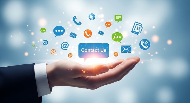 Human hand presenting a glowing "Contact Us" speech bubble with diverse communication icons like phone, email, and chat.