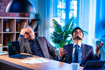 Young Indian professionals show concern over falling stock prices during investment discussion