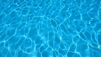 Obraz premium Water, ripples, reflections, texture, light — this close-up macro captures the dynamic play of natural light on aqua blue water, highlighting concentric ripples, shimmering hues, and subtle tonal tran