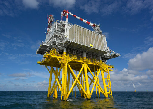 Offshore platform on North Sea under blue sky