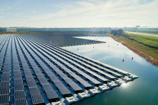 Floating solar farm near agricultural field in Netherlands