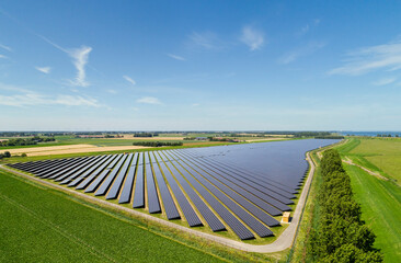 Solar farm amidst agricultural fields in Netherlands