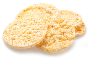 Puffed corn cakes or rice cakes isolated on white. Alternative snack for bread product.