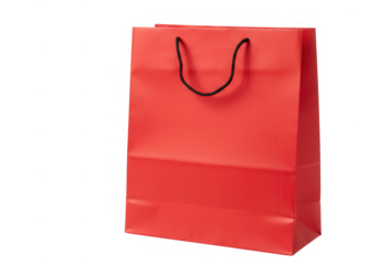Vibrant red shopping bag with black handles isolated on transparent background