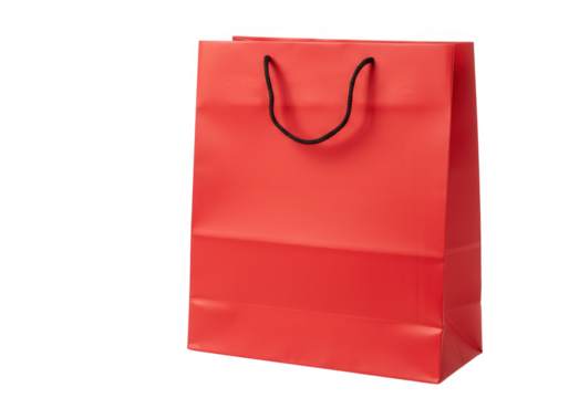 Vibrant red shopping bag with black handles isolated on transparent background