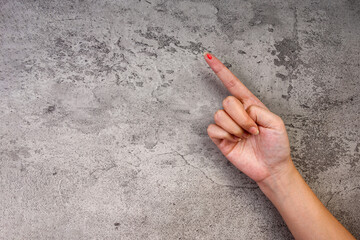 Woman Hands Drop Of Red Blood On A Fingertip After A Lancet Prick For A Glucose Test