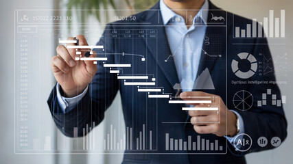 Businessman Analyzing Digital Gantt Chart and Data Analytics Dashboard for Project Management and Planning
