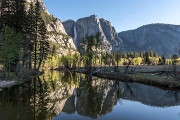 Reflections of a waterfall in Yosemite National Park