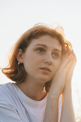 Fototapeta premium Pensive Portrait in Golden Hour Light