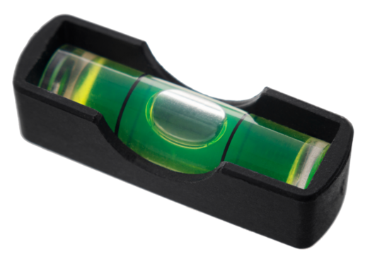 Green bubble level in balance position, isolated on white, Macro, Diagonal, Cut out