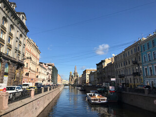 Canal Cityscape Under the Bright Blue Sky