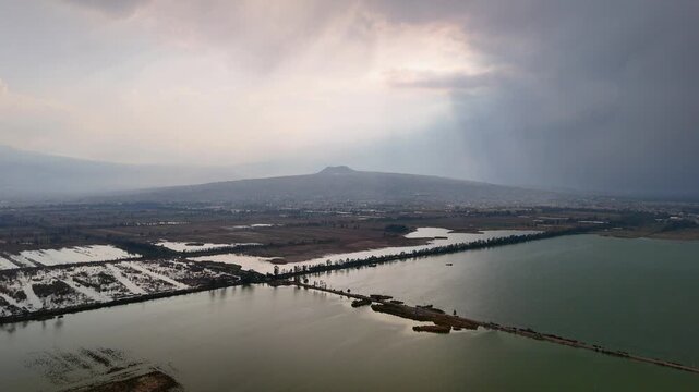 aerial shot of volcanos and lakes at mexico city basin