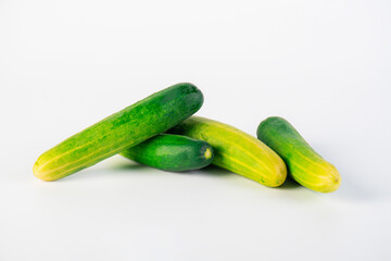 Fresh cucumbers on white background.