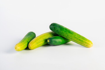 Fresh cucumbers on white background.
