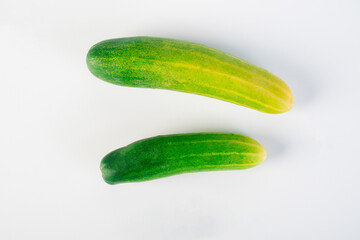 Fresh cucumbers on white background.