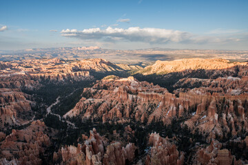 An aerial view of Bryce Canyon National Park, showcasing its unique geological formations and the...