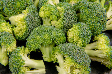 Fresh broccoli on a dark background. Top view.