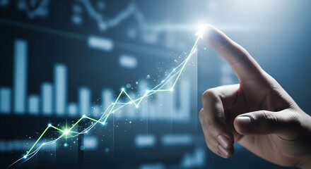 Close up of a human finger touching a glowing digital graph line indicating financial growth and technological advancement